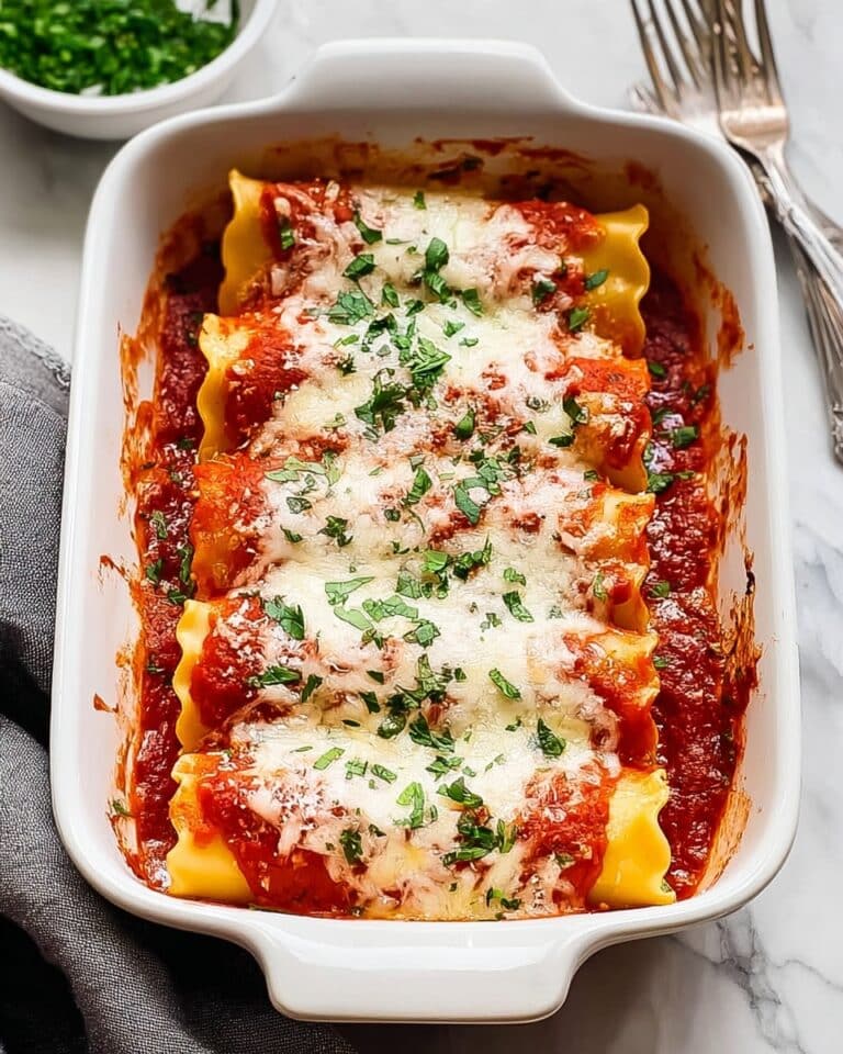 Baked Manicotti with Ricotta, Mozzarella, and Basil Recipe