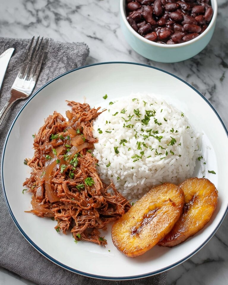Classic Ropa Vieja: Tender Shredded Beef in Savory Tomato Sauce Recipe